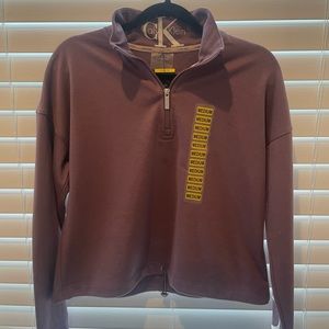 Calvin Klein 1/4 zip light pullover sweatshirt in medium. Never worn.
